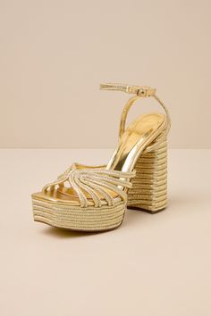 Step on the scene, ready to cause a commotion in the Lulus Seelah Gold Metallic Strappy Platform High Heel Sandals! Metallic fabric, with a braided-like design throughout, shapes these show-stopping heels with a 1.5"" toe platform, squared footbed, and a network of straps that create a wide vamp with cutouts. Matching straps sprout from the sides and secure around the ankle with a gold buckle. A sky-high block heel completes the look! 5. 25" wrapped block heel. Cushioned insole. Rubber sole has Gold Platform Sandals, Gold Platforms, Strappy High Heels Sandals, Strappy High Heels, Metallic Fabric, Platform High Heels, Platform Wedge Sandals, Sky High, The Scene