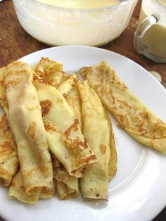 some food is on a white plate and ready to be eaten