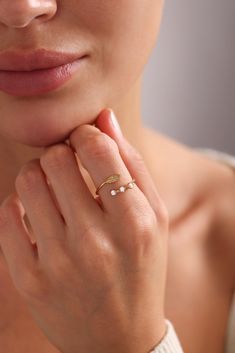 D I A M O N D ∙ ⚘ ∙ L E A F ∙ ⚘ ∙ R I N G Enhance your style with our exquisite Diamond Leaf Ring. This elegant and unique ring features a natural design with a delicate leaf adorned with three sparkling diamonds, adding a touch of nature-inspired beauty to any look. Perfectly balanced for both everyday wear and special occasions, it brings a subtle yet captivating charm to your ensemble. The distinctive design with a leaf and diamonds makes it a versatile accessory for any setting, from sporty White Open Ring With Initial For Anniversary, White Open Initial Ring For Anniversary, White Initial Open Ring For Anniversary, White Initial Ring Fine Jewelry For Gift, White 14k Gold Open Ring Midi Rings, White 14k Gold Open Midi Rings, Delicate White Stackable Rings For Gift, White Birthstone Stackable Open Rings, White 14k Gold Initial Ring Gift