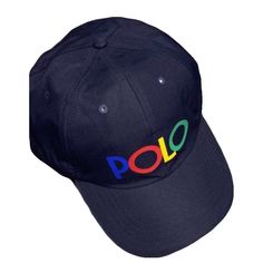 Polo Ralph Lauren Hat With Multi Color Polo Logo, Color R Blue, Red, Yellow, Green And Adjustable Stripes On Black With Pony Logo Trendy Blue Hats With Embroidered Logo, Casual Multicolor Hat With Embroidered Logo, Trendy Blue Baseball Cap With Short Brim, Multicolor Cap With Embroidered Logo, Multicolor Embroidered Logo Cap, Casual Multicolor Flat Brim Baseball Cap, Ralph Lauren Bucket Hat, Ralph Lauren Hat, Navy Blue Hat