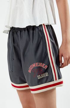 PacSun exclusive! Give your next look a sporty edge with the Budweiser By PacSun Basketball Shorts. These comfy high-waisted shorts are made from a lightweight fabric and feature a drawstring waistband, contrast striped trimming, Budweiser graphic at the hem, and a relaxed fit. 


	12" rise
	25" leg opening
	4" inseam
	High-rise
	Drawstring waistband
	Side hand pockets
	Contrast striped trimming
	Budweiser graphic
	Longer inseam 
	Relaxed fit
	100% polyester
	Machine washable
	Model is wearing a size small
	Model measurements: 5’8.5” height, 32” bust, 23.5” waist, 35” hips Slim Fit Cargo Pants, Kids Activewear, Curve Jeans, Jeans Kids, Kids Swimwear, Basketball Shorts, Slim Fit Pants, Womens Activewear, Drawstring Waistband