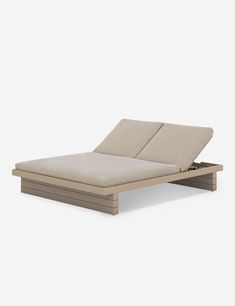 a bed that is made out of wood and has a mattress on the bottom side