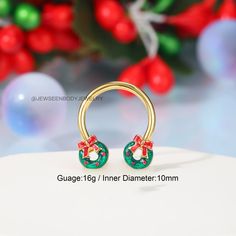 One package contains one piece 16g christmas septum jewelry Gauge:Bar Thickness:16g(1.2mm);Inner Diameter:10mm. MATERIAL: Made of 316L Stainless Steel, Hypoallergenic, Nickle and Lead Free, Harmless to Your Piercing and Shorten the Healing Time of Piercing This cartilage earring is gold christmas ring design,whcih can be used as septum ring,daith earring,helix jewelry,hoop earring and so on. This is an ornament with Christmas elements and atmosphere, which is perfect for your family and friends Unique Septum Ring As Gift, Unique Pierced Septum Ring As Gift, Unique Handmade Septum Ring For Gift, Halloween Septum Ring, Yellow Gold Diamond Septum Ring Gift, Christmas Ring, Helix Jewelry, Horseshoe Ring, Tragus Jewelry