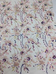 We offer a variety of fashion handmade fabric，those are widely use for wedding dress，garment and fashion cloth. we sell it by yard，our minimum order is 1 yards，and we always package it 15 yards for one roll，the width is 125cm/47 inch Material ： mesh ，Rayon,polyester. Symmetrical embroidery floral pattern, with lovely flowers in the middle, scalloped border. You can also cut and use separately. Perfect for dress, tops, wedding veil. You can split the piece up and have one scalloped edge around th Pink Embroidered Fabric With Floral Applique For Party, Elegant Pink Sequin Fabric With Floral Embroidery, Elegant Pink Sequin Fabric For Summer, Pink Sequin Fabric With Floral Embroidery For Spring, Pink Floral Embroidered Sequin Fabric For Spring, Spring Pink Sequin Fabric With Floral Embroidery, Multicolor Sequin Fabric For Spring Wedding, Pink Fitted Sequin Fabric With Floral Embroidery, Spring Multicolor Sequin Fabric For Weddings