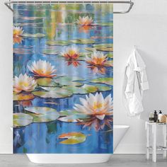 a shower curtain with water lilies on it