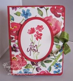 a close up of a card with flowers on it