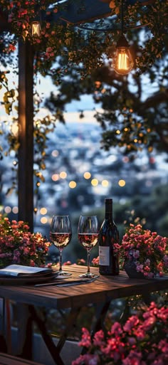 two wine glasses sitting on top of a wooden table