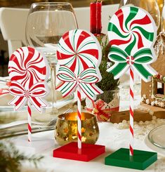 some candy canes are sitting on a table