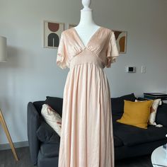 The Dress Is Brand New. Stunning Champagne Color Perfect For Wedding Party. Chic V-neck Spring Gown, Feminine V-neck Gown For Spring, Feminine V-neck Spring Gown, Flowy V-neck Wedding Dress, Summer Evening V-neck Gown, Spring V-neck Evening Dress For Wedding Guest, Spring Wedding Guest V-neck Evening Dress, Spring Floor-length Bridesmaid Midi Dress, Floor-length Spring Bridesmaid Midi Dress