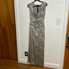 New Very Nice Maxi Dress Silver Sleeveless Maxi Dress For Night Out, Sleeveless Silver Maxi Dress For Night Out, Silver Sleeveless Maxi Dress For Evening, Silver Sleeveless Maxi Dress For Gala, Silver Floor-length Dress For Night Out, Silver Sleeveless Maxi Dress For Cocktail, Silver Maxi Dress For Formal Party Season, Metallic Shimmer Dress For Formal Occasions, Elegant Sleeveless Maxi Dress With Shimmer