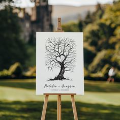 an easel with a drawing of a tree on it