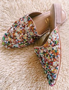 Fulfilled by our friends at Llani Party time! Our confetti slides by Llani are just what you need to lift your mood and start a party everywhere you go. These vintage inspired suede loafers are completely embellished by hand. Sequins in all shapes and colors create a stunning mix of texture and shine. Luxury meets effortless comfort with a memory foam cushioned insole. Upper: 100% Genuine Suede with hand embellishment Lining: 100% Genuine Leather Outsole: 100% Genuine Leather *orders with estm. Hand Embellishment, Shoes Art, Footwear Fashion, Embellished Shoes, Glam And Glitter, Shapes And Colors, Walk This Way, Teacher Outfits, All Shapes