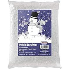 a bag of white snowflakes sitting on top of a blue and white background