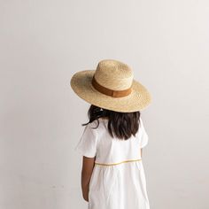 Your favorite hat, just a little smaller. From family pictures, to running errands, to play dates at the park - the Capri can go everywhere your fearless kids do. Style - Boater Material - Natural dyed wheat straw featuring a camel suede band + a 100% cotton inner sweatband Dimensions - Crown: 9 cm + Brim: 11 cm Check out all our Kids Hats styles here! Capri Shorts, Kids Beanies, Boater Hat, Wheat Straw, Halo Style, Wearing A Hat, Kids Hats, Kids Shorts, Family Pictures