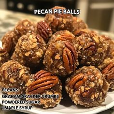 pecan pie balls with graham cracker crumbs on a white plate