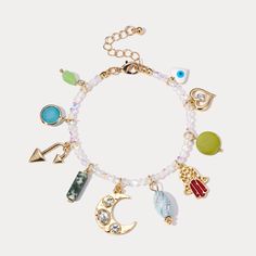 Capture the essence of summer with this unique Evil Eye Colorful Beaded Bracelet! Featuring a combination of multi-colored elements and a shining evil-eye, it is perfect for those who believe in the power of good luck. Adorable and pastel, this bracelet is a must-have for warding off misfortune and bringing a touch of the sea to your style. DETAILS Plating: 18K Gold Materials: 18K Gold on Brass, Natural Stones, Glass Beads Measurements: Length: 7.48"(19cm) + Extender: 1.96"(5cm) Weight: 15g Symbolic Multicolor Festival Jewelry, Symbolic Multicolor Beaded Jewelry, Bohemian Multicolor Metal Charm Bracelet, Bohemian Style Multicolor Metal Charm Bracelet, Multicolor Beaded Metal Charm Bracelet, Multicolor Bohemian Evil Eye Bracelet With Colorful Beads, Multicolor Bohemian Evil Eye Bracelet For Festivals, Bohemian Multicolor Evil Eye Bracelet For Festivals, Bohemian Multicolor Beaded Evil Eye Bracelet