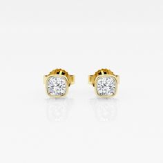 Get cozy with these cushion shaped diamonds wrapped around with a beautiful bezel. Lab grown diamond stud earrings that make a perfect gift for that perfect someone. Luxury Yellow Gold Diamond Earrings With Bezel Setting, Luxury Diamond Earrings With Cushion Cut And Accents, Cushion Cut Diamond Luxury Earrings, Elegant Cushion Cut Yellow Gold Earrings, Luxury Cushion Cut Diamond Earrings For Gift, Luxury Bezel Set Diamond Earrings For Formal Occasions, Luxury Bezel Set Earrings As Gift, Luxury Diamond Earrings With Bezel Setting For Formal Occasions, Classic Cushion Cut Diamond Earrings For Wedding