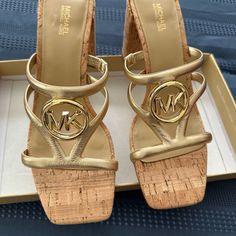 Brand New Beautiful Michal Kors Hampton Gold Sandals With Cork Heel Approx Heel Size 3 Inches Gold Heels With Cushioned Footbed, Gold Sandals With Cork-bed Midsoles, Gold Mules With Cushioned Footbed, Gold Open Toe Mules With Cushioned Footbed, Gold Heels With Cushioned Footbed And Open Heel, Gold Open Heel Heels With Cushioned Footbed, Gold Espadrilles, Michael Kors Sandals, Michael Kors Fashion