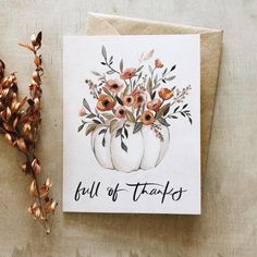 a card with an illustration of pumpkins and flowers on it that says fall of thanks