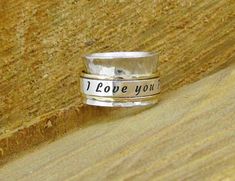 "Custom Engraved Rings, Silver Hammered Ring, Personalized Ring, Wide Band Rings For Women, Anniversary Gift, Spiritual Rings, Love Ring Hammered 925 sterling silver spinner meditation ring with three spinning bands - two gold filled or 14K solid gold bands and wide silver band with custom engraved. This ring is simply the most beautiful way to show your wife/mom, how much you love and appreciate her. A perfect gift for a birthday, valentine day, wedding, mothers day, holidays gift or just to sh Spiritual Rings, Silver Hammered Ring, Wide Silver Band, Hammered Silver Ring, Hammered Ring, Solid Gold Band, Hammered Rings, Personalized Ring, Meditation Rings