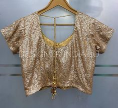 This is a custom stitched Rose Gold Sequins Fabric Blouse for Women and GirlsI make it exclusively for my customers by using designer fabrics.I will only make it after you confirm your required size details. Handling time: Don't worry, just tell me, I will process it accordingly and deliver on or before a delivery date you mention.Size: This is custom made as per your size. Any size possible be it for kids or plus sizes women.Post your order I will send you a measuremnts reference sheet using wh Gold Sequin Fabric, Wedding Wear Saree, Choli For Women, Party Wear Lehenga Choli, Sequins Fabric, Reference Sheet, Rose Gold Sequin, Saree Blouses, Party Wear Lehenga