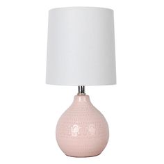 a pink ceramic table lamp with a white shade on the base and a white fabric lampshade