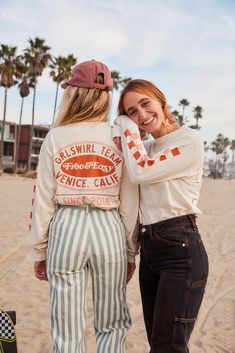 Limited Edition Free and Easy x GRLSWIRL collection is finally here! Made from quality cotton, this long sleeve is something you'll never want to take off. Perfect for a chilly morning cruise, or to immediately look cute for any outing. Hoodie, long sleeve and hat all made with love in LOS ANGELES. Runs small ONLY 50 OF EACH PIECE MADE Cute Long Sleeve Spring Sweatshirt, Retro Long Sleeve Spring Tops, Retro Long Sleeve Tops For Spring, Retro White Long Sleeve Top, White Retro Long Sleeve Top, Trendy Winter Cotton Long Sleeve Top, Trendy Cotton Long Sleeve Top For Winter, Spring Cotton Long Sleeve Top With Graphic Print, Cute Long Sleeve Tops With Relaxed Fit