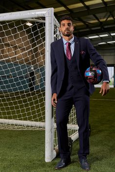 As worn by West Ham United left back Emerson Palmieri! This classic navy three-piece suit from The WHU Collection is designed to keep you looking sharp and feeling comfortable. The Prince of Wales check pattern is a timeless style for formalwear, and the elastane fabric guarantees a flexible fit for all-day wear. The classic navy hue is sure to be a hit at any dressy event. Features Slim fit Single-breasted waistcoat Prince of Wales check Notch lapel Single back vent Four button cuff Double butt Emerson Palmieri, Prince Of Wales Check, Velvet Accents, Checked Trousers, West Ham United, Checked Blazer, West Ham, Three Piece Suit, Elastane Fabric