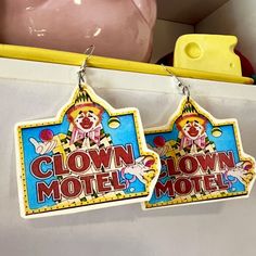 Clown Hotel earrings clowncore jewelry accessories  Handmade lightweight laminated  dangle style earrings  Tags; clown clowncore kidcore weirdcore earrings jewelry accessories clowns unique kitschy kitsch fashion Weirdcore Earrings, Clown Hotel, Clowncore Jewelry, Clown Core Fashion, Kooky Fashion, Clowncore Fashion, Clowncore Kidcore, Clown Ideas, Clown Stuff