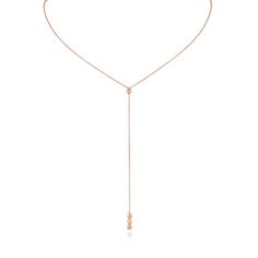 Keep these tiny truths close to your heart. Delicate and smooth, the Seed Lariat is a necklace that will last a lifetime. This lariat has three small seeds that hang beautifully from a dainty golden chain. This necklace is the most elegant of pieces, making it the perfect choice to effortlessly dress up any look. The Seed Lariat is stunning and will bring classic beauty to your jewelry collection. Dainty Rose Gold Lariat Necklace, Fine Jewelry Lariat Necklace With Pendant And Adjustable Chain, Fine Jewelry Lariat Drop Necklace With Adjustable Chain, Delicate Long Drop Clavicle Chain Necklace, Delicate Rose Gold Lariat Necklace, Dainty Long Drop Necklaces With Adjustable Chain, Dainty Long Drop Necklace With Adjustable Chain, Fine Jewelry Long Drop Necklace With Adjustable Chain, Dainty Clavicle Pendant Lariat Necklace