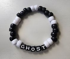 A bracelet for the Ghost band fan! Plenty of stretch for comfortable fit Ghost Band Bracelet Ideas, Xplr Bracelet Ideas, Xplr Bracelet, Emo Beaded Bracelets, Grunge Bracelet Ideas, Ghost Band Bracelet, Bracelet Word Ideas, Beaded Jewelry Inspiration, The Ghost Band