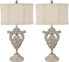 a pair of lamps sitting next to each other