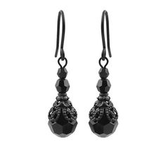 Blackened brass filigree and adornments paired with romantic jet black Swarovski crystal beads. ---------------------------------------------------------------------------------------------Dimensions and details:- Largest beads measure 8mm in diameter- From the top of the hook ear wires to the bottom of the earrings, they measure approximately 33mm- Beads are genuine Swarovski crystal.- Filigree is USA-made blackened brass.- Ear wires are nickel-free black-finished brass------------------------- Formal Black Filigree Earrings, Elegant Black Filigree Earrings, Black Filigree Earrings, Black Filigree Earrings For Gift, Black Filigree Earrings As Gift, Evening Earrings With Black Beads, Victorian Style Jewelry, Black Crystal Earrings, Blackened Brass