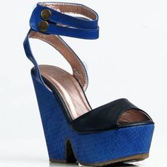 Lisa Is One Of The Comfy Sandals This Season!! Featuring; Black Wide Contrasting Strap With Open Toe, Blue Snake Embossed Lower Platform And Heel, Two Button Ankle Strap For Closure, Short Comfy Heel. Brand: Maker's Heel Height: 4.5 Short Chunky Heel Platform: 2' Material: Faux Leather Fits True To Size Trendy Blue Wedge Sandals With Round Toe, Trendy Blue Synthetic Wedge Sandals, Trendy Blue Open Toe Wedge Sandals, Blue Wedge Sandals With Platform And Round Toe, Blue Platform Wedge Sandals With Round Toe, Blue Synthetic Wedge Sandals With Ankle Strap, Blue Platform Wedge Sandals With Open Heel, Blue Synthetic Ankle Strap Wedge Sandals, Blue Block Heel Wedge Sandals For Summer