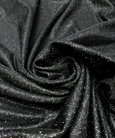 Black Lurex Fabric,Blue Glitter Spandex Knit Fabric, Black Sparkle Fabric, Shimmer Fabric by the Yard. Our Metallic Lurex Fabric s full of glitter which gives it a beautiful shine and sparkle. Featuring a two-way stretch for flexibility and ease of movement, this fabric is adorned with metallic glitters that create a shimmering, iridescent effect. Perfect for a range of projects including evening wear, dance costumes, party apparel, and decor, this fabric is designed to make a statement with its Black Sparkling Sequin Fabric For Glamorous Style, Black Sparkling Sequin Fabric For Party Season, Sparkling Black Sequin Fabric For Party Season, Black Sparkling Sequin Fabric For Evening, Glamorous Black Sequin Fabric With Glitter, Glamorous Black Glitter Sequin Fabric, Metallic Stretch Sequin Fabric With Glitter, Stretch Metallic Sequin Fabric With Glitter, Black Sparkling Sequin Fabric For Night Out