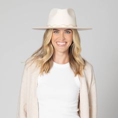 Introducing Amore - a luxurious wool fedora with a stiff brim and twisted rhinestone trim. The ivory color, organza back ties, and inner satin lining add a touch of elegance to this statement piece. With an adjustable fit and 3.5" brim, this fedora is perfect for any woman looking for sophistication and style. Features: Color: Ivory Material: 100% Wool Brim Size: 3.5" Size: 57cm Wool Felt Stiff Brim Fedora Twisted Rhinestone Trim Organza Back Ties Inner Satin Lining Adjustable Elegant Flat Brim Panama Hat For Fall, Elegant Fedora Panama Hat For Fall, Elegant White Fedora With Flat Brim, Elegant White Flat Brim Fedora, Elegant Adjustable Panama Hat For Fall, Chic Cream Fitted Fedora, Elegant Cream Fedora Panama Hat, Elegant Cream Wide Brim Fedora, Elegant Adjustable Wool Felt Hat