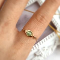 This cute handmade wire wrapped ring is made with genuine and natural Jade gemstone in a light green color. The metal part is 14k gold filled or sterling silver of your choice. ✨ Simple & cute ring in a clean and minimalist design. Jade Gemstone Meaning:💚 Abundance, Luck, Protection; Jade is a wonderful stone that is used to bring good luck, wealth, and energy protection to the wearer. In Chinese culture, it is a symbol of prosperity, wellness & harmony. • Gemstone Diameter: 4 mm• Ring Band: 0. Gemstone Rings Unique Modern, Natural Stone Rings Gemstone, Jade Eyes, Gemstone Rings Unique, Energy Protection, Cute Ring, Raw Crystal Ring, Single Stone Ring, Light Green Color