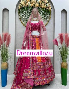 Lehenga Fabric: Faux Georgette with Digital Print Work: Thread with sequence Size: Up to 44 Inner Fabric: Micro Type: Semi-Stitched Flair: 3 meters (includes canvas patta and cancan) Choli Fabric: Faux Georgette with Digital Print Work: Thread with sequence Size: Up to 42 (Un-Stitched) Dupatta Fabric: Faux Georgette Buttery Net Work: Thread with sequence Size: 2.20 meters Weight Total Weight: 2 kg Pink Semi-stitched Traditional Wear For Festival, Pink Choli For Party And Festival, Pink Choli For Party Festivals, Multicolor Chinon Lehenga For Wedding, Pink Art Silk Gown For Festivals, Multicolor Chinon Choli For Wedding, Multicolor Lehenga With Resham Embroidery For Festival, Multicolor Wedding Gown For Navratri, Wedding Embroidered Lehenga In Chinon