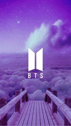 the bts logo on top of a purple sky with clouds and stars in the background