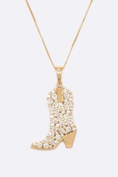 Saddle up in style with our Cubic Zirconia Cowboy Boot Pendant Necklace! This unique accessory features a charming cowboy boot pendant, adorned with sparkling cubic zirconia for a touch of glamour. Perhaps perfect for cowgirls at heart? (Yeehaw!)Necklace - 18" + ExtensionCubic Zirconia, BrassLead & Nickel Compliant Cowboy Necklace, Fall Fashions, Halloween Goodies, Necklace Necklace, Cowboy Boot, Country Girl, Gold Pendant Necklace, Fashion Jewelry Necklaces, Autumn Fashion Women