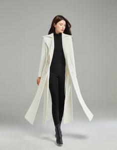 "★★ FEATURES 50% wool blend, 50% fiber, nylon Polyester lining Two side pockets Notched collar Long sleeve coat Double breasted wool coat Asymmetrical wool coat A-Line wool coat Belted wool coat Perfect for winter, autumn Dry clean * Size XS-Sample is ready to ship, Only 1 available, don't accept refund, exchange ★★Mode size Height 170cm (5′ 7″) Bust 84 cm (33\") Waist 66 cm (26\") She wears size XS. ★★ Custom order selection, Will charge 20USD-70USD custom fees Request Chang the Length Request Aritzia Conner Coat, Winter Sweater Coat With Lapel Collar, Winter Long Single Breasted Outerwear, Winter Long Single-breasted Outerwear, Single Breasted Long Winter Outerwear, Long Single-breasted Winter Outerwear, White Wool Coat For Winter, White Wool Coat With Lapel Collar For Fall, Winter White Wool Long Coat