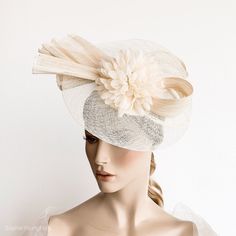 Elegant Ivory Kentucky derby hat for woman. This cream fascinate hat is embellished with a big bow. It is a perfect hat for weddings, Royal Ascot horse races, cocktails, derby... It is mounted on a headband. If you want, you can choose the side of the head were you like to wear the fascinator, just convo me. Any color of the fascinator can be changed to order. ** PROCESSING TIME: 5 -7 business days. ** DELIVERY TIME (DHL Express): 2-4 business days to EEUU, 1-2 to Europe and 3-5 to Australia. Fo Formal Cream Headpiece With Short Brim, Evening Mini Hat In Cream With Short Brim, Cream Evening Mini Hat With Short Brim, Elegant Cream Hat Headpiece, Beige Evening Fascinator Hat, Adjustable Cream Cloche Fascinator, Beige Short Brim Headpiece For Evening, Chic Cream Adjustable Headpiece, Chic Adjustable Cream Headpieces