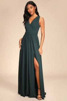 The Lulus Thoughts of Hue Emerald Green Surplice Maxi Dress will have you dreaming of romantic evenings under starlit skies! Lightweight woven chiffon drapes into a sleeveless, surplice bodice and V-back, atop a banded waistline. Cascading skirt falls to a maxi hem with a sultry side slit. Hidden back zipper with clasp. Fit: This garment fits true to size. Length: Floor length. Size medium measures 61" from shoulder to hem. Bust: Great for any cup size. Waist: Fitted - very fitted at natural wai Vestidos Color Verde Esmeralda, Black Tie Wedding Guest Dress, Black Tie Wedding Guests, Maid Of Honour Dresses, Emerald Green Dresses, Green Bridesmaid, Formal Dresses Gowns, Green Bridesmaid Dresses, Prom Dresses Online