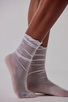 Simple and subtle, these dainty tulle socks add a sweet sheer detail to your favorite shoes. **Fit:** Crew length; S/P fits shoe sizes 5-7 US, M/L fits shoe sizes 8-10 US **Features:** Mesh fabrication, seamed toe, subtle ruffle trim **Why We | Tulle Crew Socks by Only Hearts at Free People in White, Size: S/P Tulle Socks, Only Hearts, Boho Clothing, Ruffle Trim, Crew Socks, Boho Outfits, Free People, Socks, Mesh