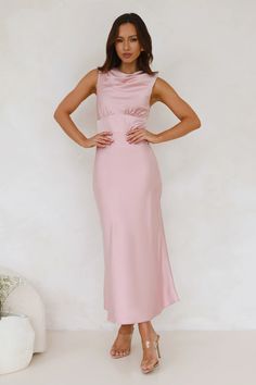 Length from shoulder to hem of size S: 134cm.   Chest 41cm, Waist 35cm, across front only of size S.   Maxi dress.  Lined.  Model is a standard XS and is wearing XS.  True to size.  Non-stretch.  Satin.  High cowl neck.  Button closure to back of neck.  Gathered details to top.  Zipper with hook eye closure.  Cold hand wash only.  Polyester/Spandex.   For a sleek, sophisticated look, choose the Together As One Satin Maxi Dress. Featuring a silky satin, a high cowl neckline and gathered details to the top. Style with heels for classy attire. Classy Attire, Bridal Shower Dress, Shower Dresses, Maxi Dress Wedding, Maxi Robes, Satin Maxi, Cowl Neckline, Satin Maxi Dress, Long Sleeve Lace Dress