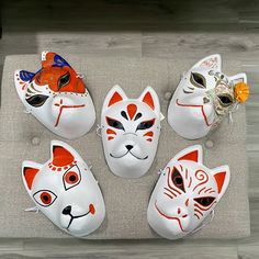 It's Fox masks that you can wear for fun! It's made by paper with water resistant coating. Fox masks are commonly used in traditional Japanese performing arts like Kabuki. In these contexts, the fox mask represents a fox spirit symbolizing aspects such as intelligence, protection, and spiritual significance. White Kawaii Cosplay Costume For Halloween, Fun Full Face Halloween Mask, White Full Face Mask For Cosplay, Fun Full-face Halloween Masks, Fun Halloween Cosplay Masks And Prosthetics, White Mask Costume Accessories For Cosplay, White Mask For Cosplay, White Cosplay Costume Mask, Novelty Masks For Cosplay Events