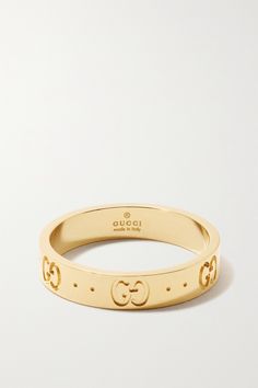 Gucci's ring is part of the 'Icon' capsule, which celebrates the house's archival motifs. It's been cast in Italy from 18-karat gold and etched with the signature 'GG' monogram, which is modeled after the founder's initials. The slim band makes it great for stacking. Gucci Ring, Gucci Bracelet, Gucci Jewelry, Gg Monogram, Jewelry Fashion Trends, Jewelry Lookbook, Jewelry Outfit, Cartier Love Bracelet, Jewelry Inspo