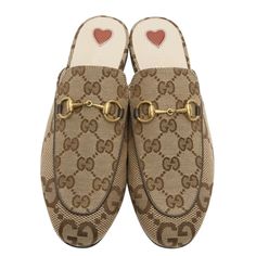 Brand: Gucci Condition: Brand New In Box With Dust Bag. Retail: $890 + Tax! 100% Authentic Gucci's 'Princetown' Slippers Have Become One Of The Brand's Most Coveted Styles. Topped With The House's Iconic Horsebit Hardware, This Pair Has Been Made In Italy From Leather And Canvas-Jacquard Woven With Tonal 'Gg's. * Camel And Ebony Jumbo Gg Canvas * Women's * Brown Leather Piping * Horsebit Detail * Leather Sole * Flat * .4" Heel * Made In Italy Loafers Gucci, Mule Slides, Gucci Princetown, Gucci Shoes, Mule, Flat Shoes Women, Piping, Loafer Flats, Brown Leather