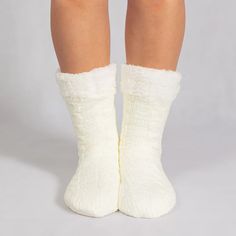 The is a super soft ONE SIZE FITS MOST pair of slipper socks that keep your feet cozy and comfortable. With a thick flannel fleece outer lining and premium sherpa fleece on the inside, theyll keep your feet toasty warm, even on the coldest floors. 100% cruelty-free. Get yours today! Package：A pair of socks Cozy Soft Socks, Soft Indoor Socks For Winter, Super Soft Comfortable Cream Socks, Super Soft Comfortable Indoor Socks, Super Soft Socks For Indoor Use, Comfortable Super Soft Cream Socks, Super Soft Comfortable Socks For Indoor Wear, Soft Comfortable Indoor Socks, Cozy Thick White Socks