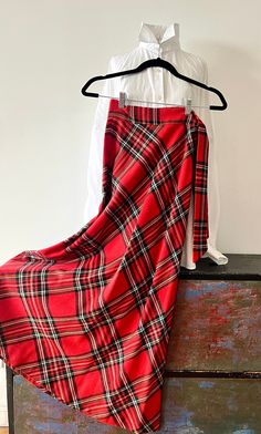 Vintage Retro Red Tartan  Skirt, Made in USA, Size XS. Side zip and tie.  Wool Blend. Unlined. Made by Sirotto Sport. In excellent condition.  A Timeless Classic!  Dress it up or down - It will work! Measure: Waist 12" Flat Hips 20" Length 40" Please note that this timeless skirt has  led a previous life, and may tell a story through minor imperfections. You may feel confident though that you're making a positive choice to care for the planet when buying them. Red Tartan Skirt, Tartan Skirt, Red Tartan, Red Plaid, Timeless Classic, Wool Blend, Tartan, Maxi Skirt, Womens Skirt